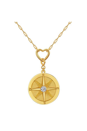 saints & saviors we wander compass pendant necklace on heart center clip chain in gold
