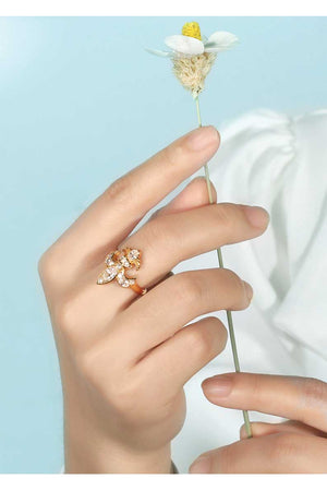 fancy fleur de lis ring with diamonds