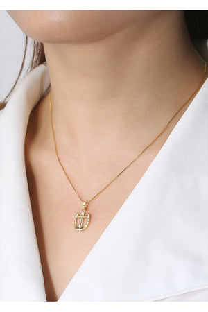 A Rider's Prayer Mini Necklace in Gold on model