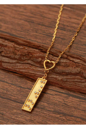 touchstone braille pendant necklace badass gold crystals