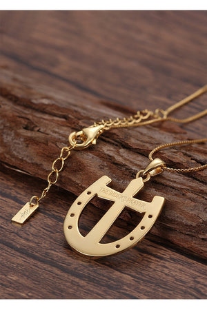 A Rider's Prayer Necklace in Gold