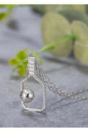 Silver pickleball necklace with diamond crystals